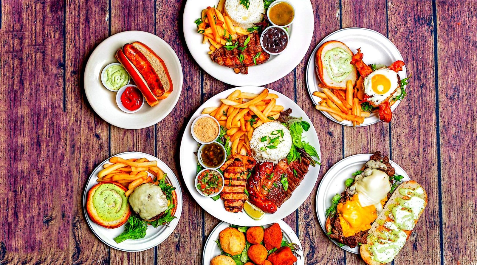 A generous table spread with Eduardo's grilled plates and Brazilian favorites